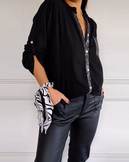 Casual top with sequin inserts and buttons