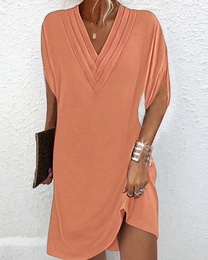 Elegant dress with plain-coloured split sleeves